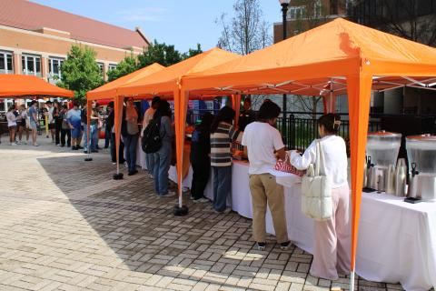 Vendor tents lined up at the carnival