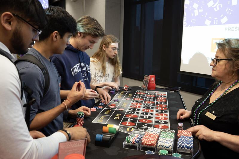 Students playing roulette at Casino Night